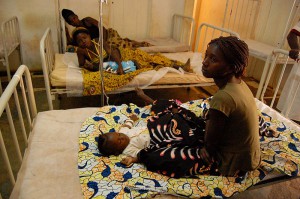 Babies receiving treatment for malaria. Image from Wikimedia Commons
